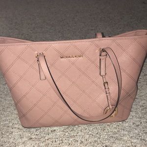 Used Michael kors In mauve color
